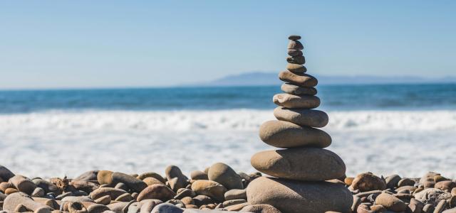 stack rock on seashore by Jeremy Thomas courtesy of Unsplash.