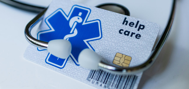 A medical id card attached to a stethoscope by Marek Studzinski courtesy of Unsplash.